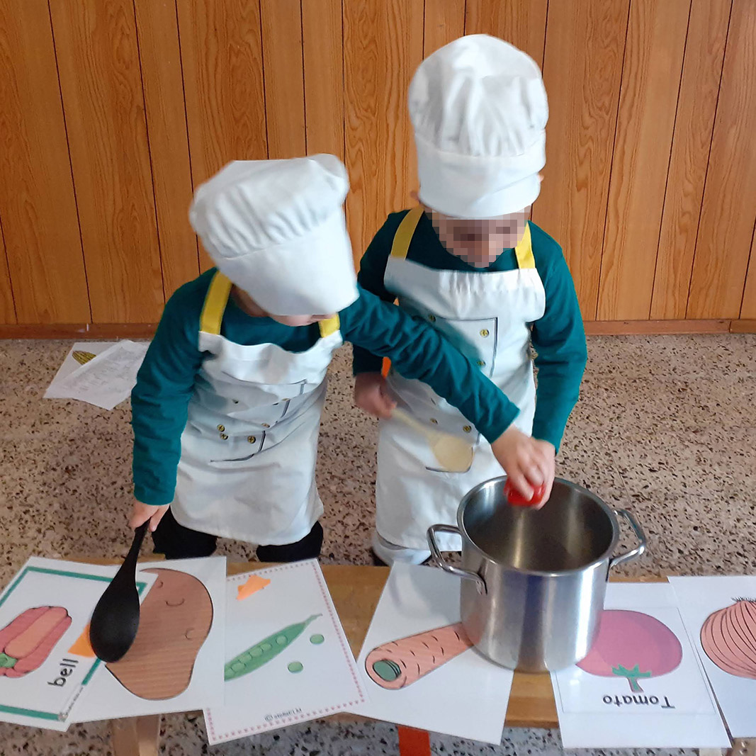 english school for kids in Turin - making a soup